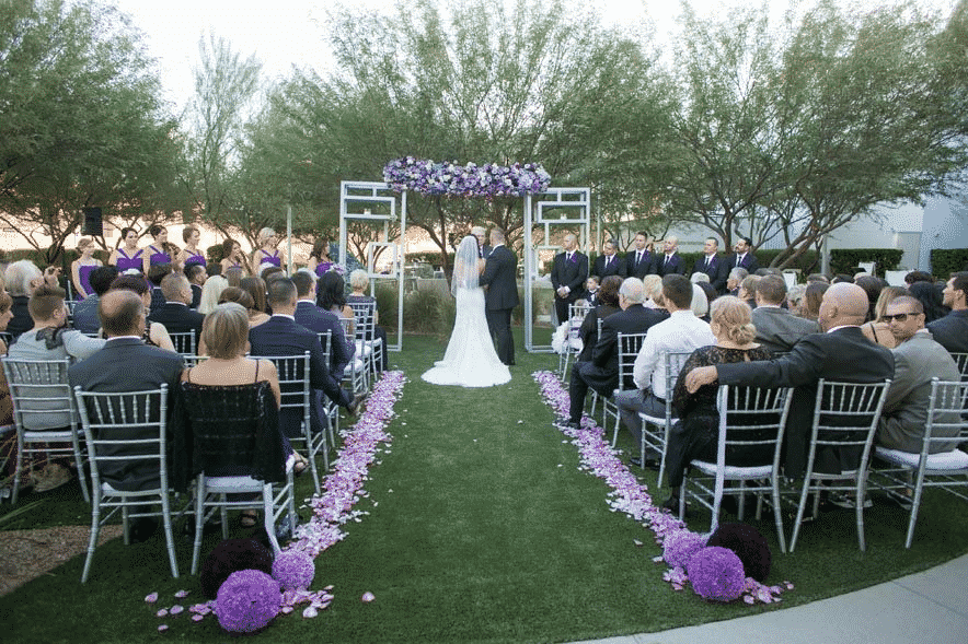 Wedding aisle and arch during a ceremony at the Keep Memory Alive Event Center in Las Vegas.