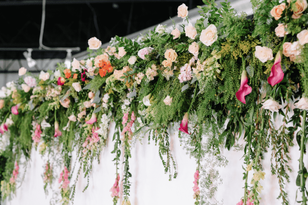 Leaf garlands hung over a table.