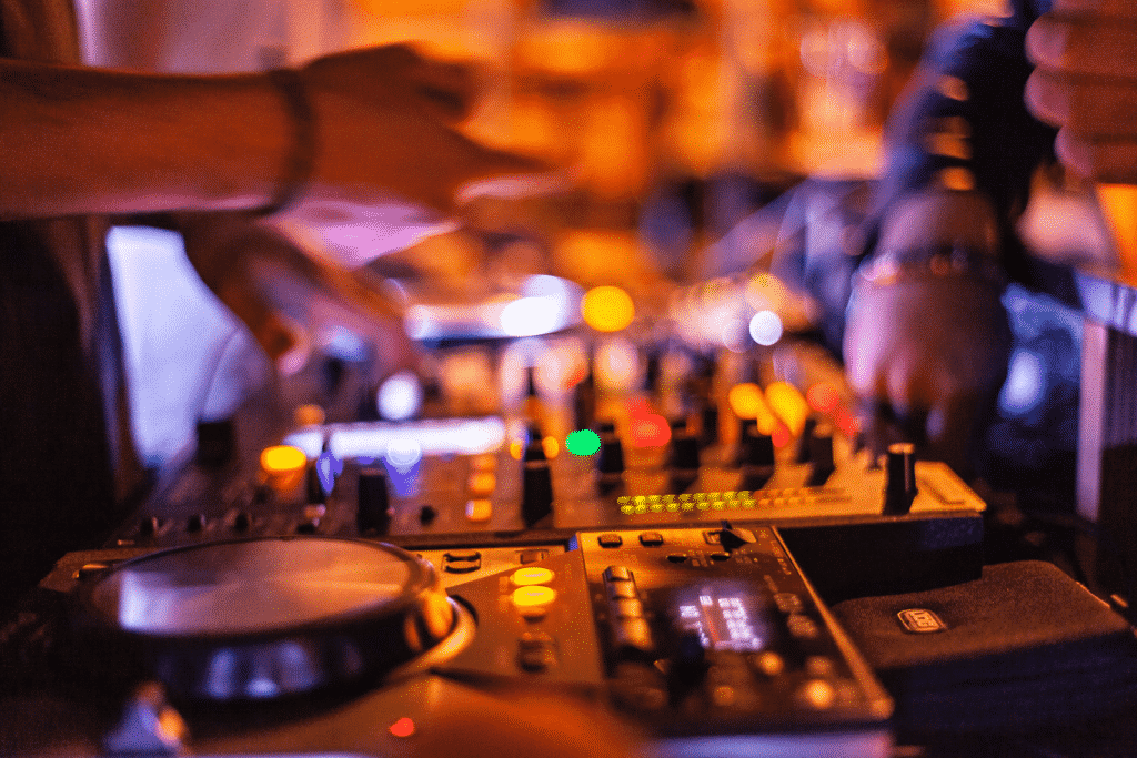 DJ using DJ equipment.