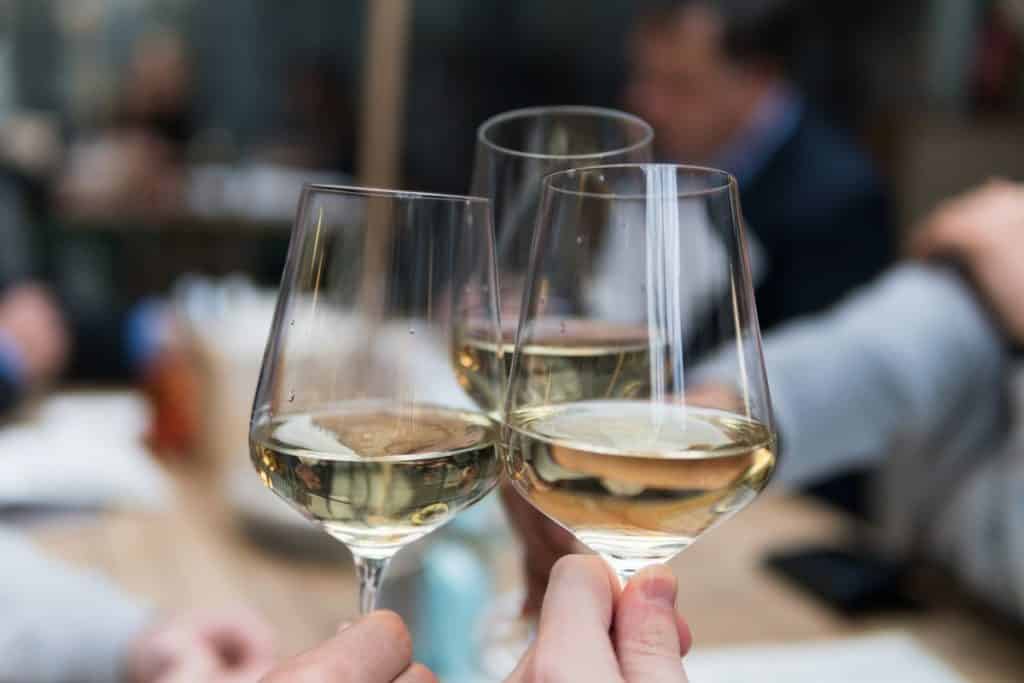 People clinking together glasses as a toast
